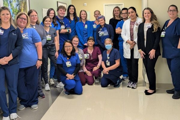 A care team at Ascension St. Vincent’s Clay County in Middleburg, FL after working together at a patient's pop up shop