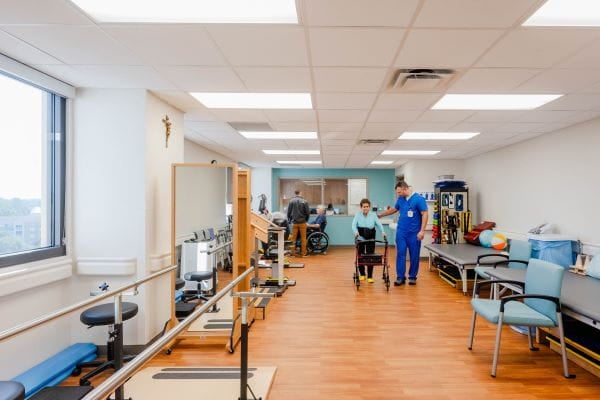 Stroke rehab patient with nurse from Ascension St. Vincent's Southside Inpatient Rehabilitation Facility