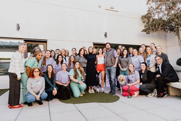 Shark attack survivor returns to thank her Sacred Heart care team