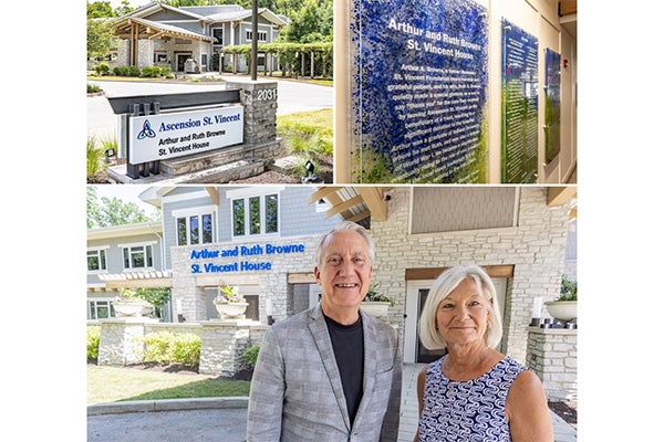 Bill Browne, Arthur and Ruth Browne’s great-nephew posing outside newly named Arthur and Ruth Browne St. Vincent House.