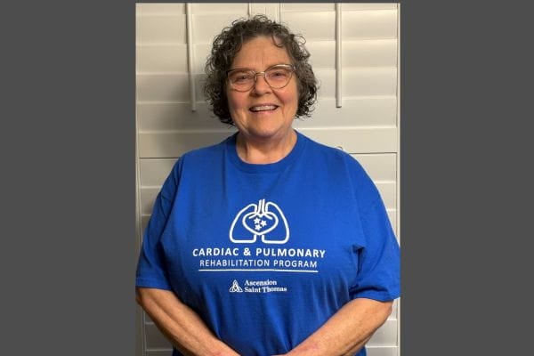 Lung cancer survivor Sherry Coate smiles for a picture