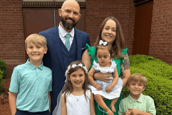 Branden with his wife and four children.
