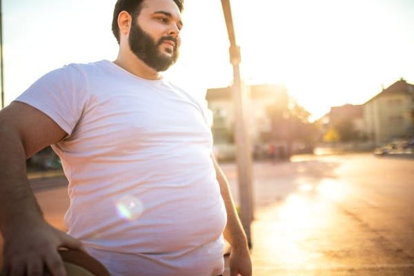 stock image of many walking outside on street