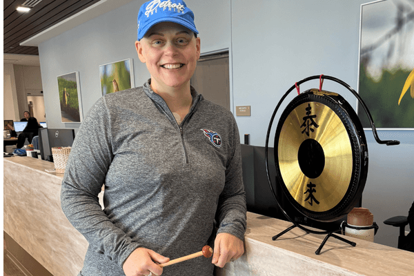 Ringing the gong to celebrate finishing active cancer treatment