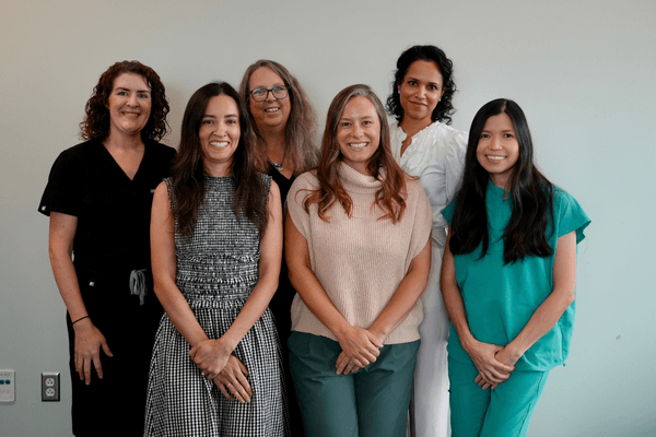 All six urology providers standing together.